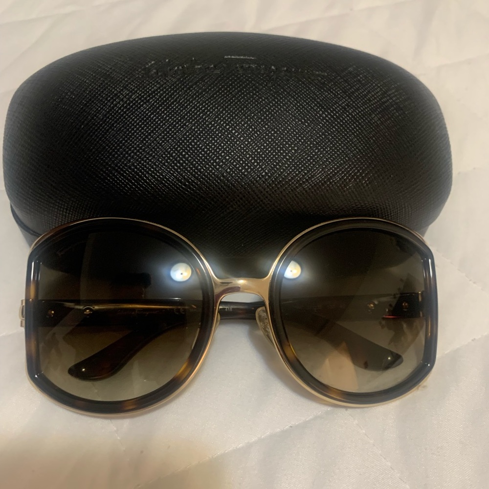 Salvatore Ferragamo sunglasses.